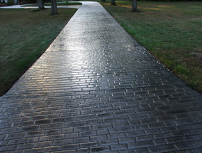 Long polished brick stamped concrete driveway in Virginia.